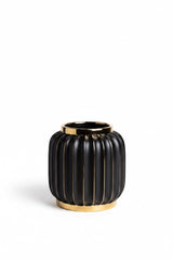 INVOKE Home and Living Vivid Vase: matte black ceramic ribbed vase with gold rim and base, modern decor accent.
