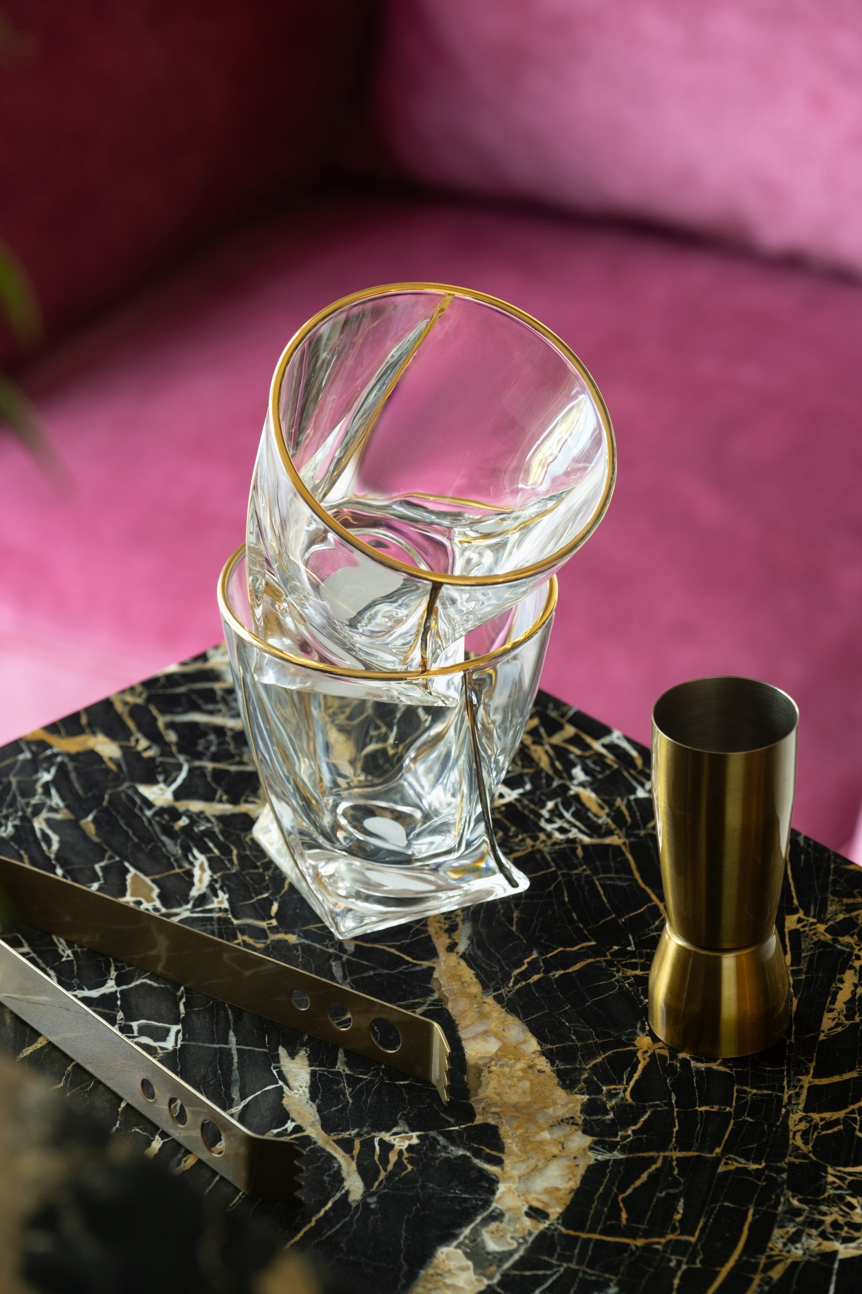 INVOKE Savoy Whiskey Glasses: clear glass tumblers with gold rim, angular design, and sturdy base. Includes ice tongs and jigger.